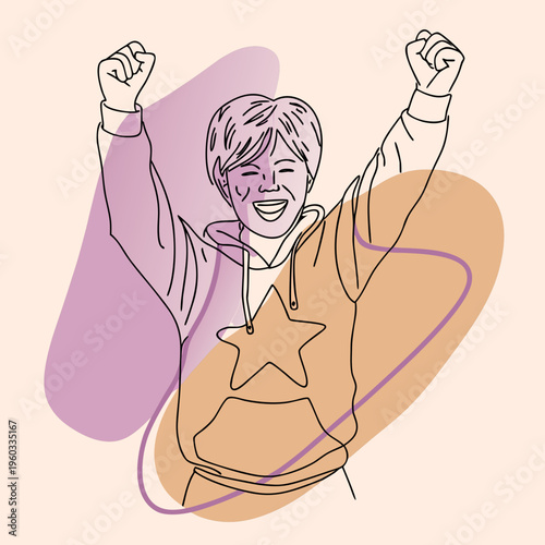 Excited young boy with a star on his sweater jumping for joy with fists raised in a celebration of happiness.
