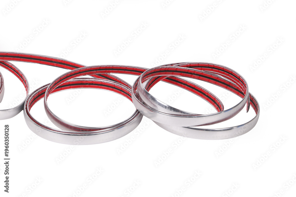Naklejka premium A Roll of Silver Edge Binding Tape on White Background