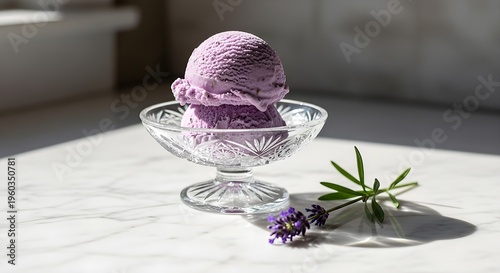 Refreshing Lavender Ice Cream Scoops Served In A Clear Crystal Dessert Bowl On White Marble Surface