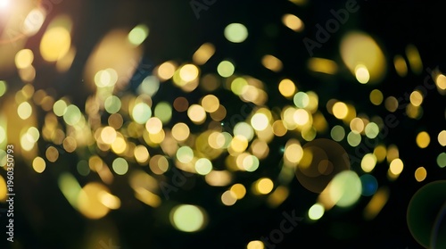 Abstract Golden Green Bokeh Lights Floating on Dark Background with Soft Lens Flare