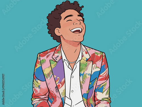 Young man smiles while wearing a colorful suit against a bright blue background during a photoshoot