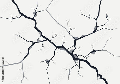 Cracked White Surface with Deep Jagged Lines and Dark Shadows