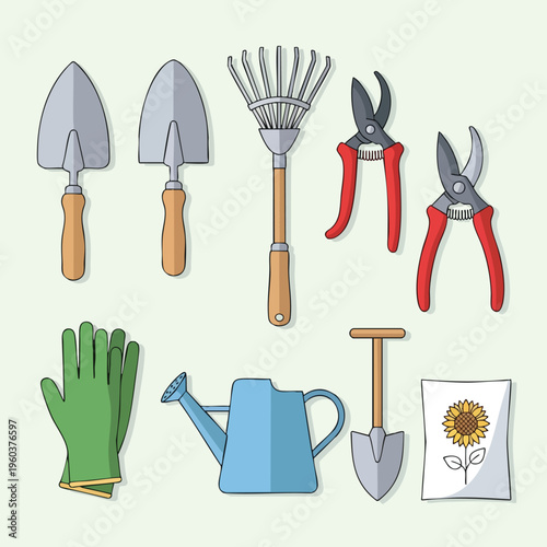 Collection of gardening tools and a seed packet with a sunflower illustration