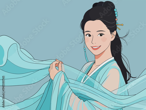 Young woman smiles while wearing traditional clothing with blue fabric flowing around her in a simple background