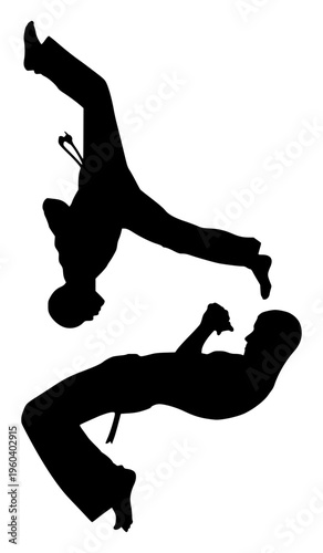 Minimalist vector silhouette of two Capoeira practitioners engaged in an acrobatic duel. This high-contrast black illustration captures a dynamic aerial kick and defensive maneuver.
