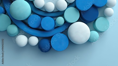 Numerous circular and curved forms in varying shades of blue and white overlap in a three dimensional composition.