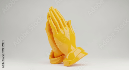 Bright Yellow Praying Hands Sculpture on White Background - Symbol of Hope and Faith