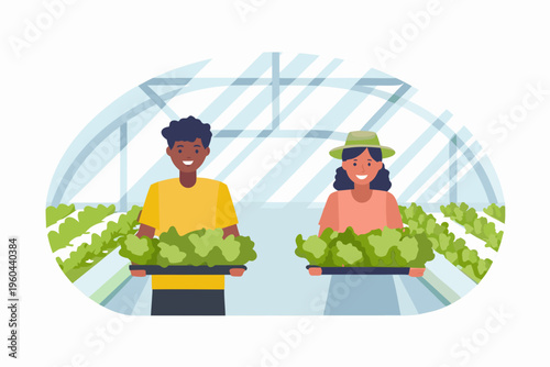 Two farmers happily carrying trays of fresh green produce in a greenhouse