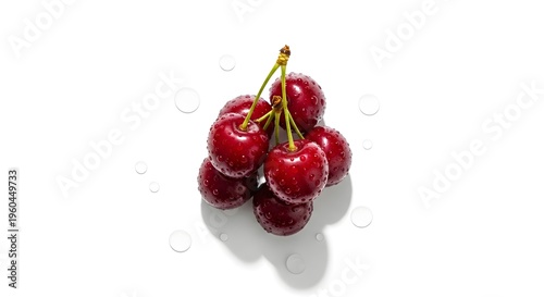 A cluster of fresh ripe and juicy cherries on a stem