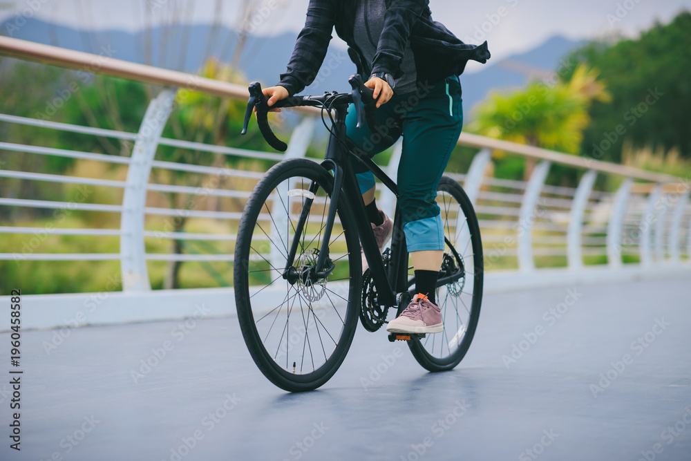 Fototapeta premium Riding bike on seaside road
