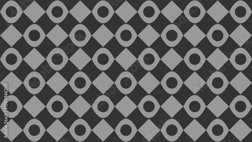 Geometric pattern of repeating diamonds and circles in two colors. Ideal for backgrounds, textiles, and stationery designs. Bold and eyecatching.