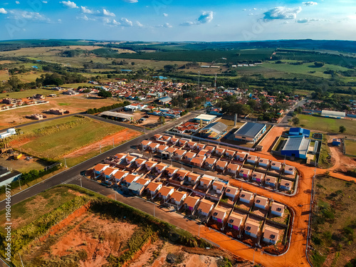 Wallpaper Mural Aerial view of Fernao, a small town in the state of Sao Paulo, Brazil, featuring a residential housing development in an urban expansion area with standardized homes. Torontodigital.ca
