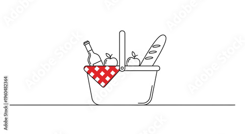 Delightful outdoor picnic basket with fresh fruit, artisan bread, and a beverage bottle for a