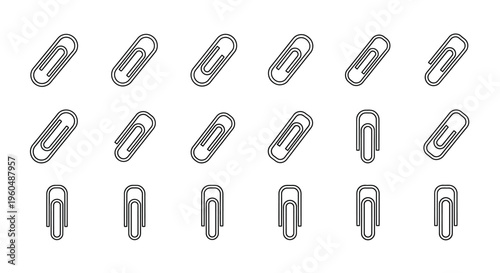 Arrangement of silver paper clips on a white background