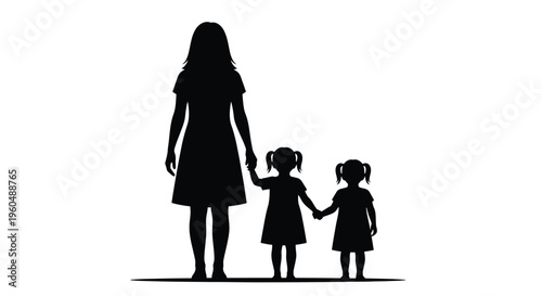 Silhouette of a mother holding hands with two young daughters