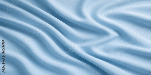 Blue satin and silk fabric with smooth flowing texture and shiny luxurious waves