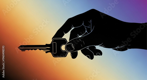 Hand Holding a Metal Key.