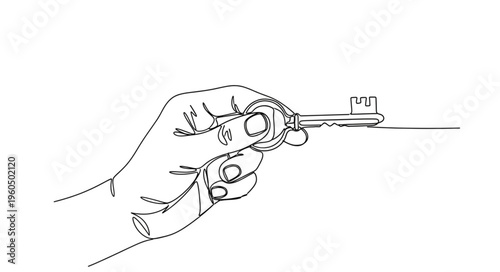 Hand holding a key closeup.