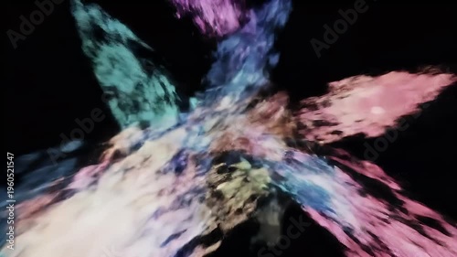 Vibrant colorful abstract art form explodes in motion against black background