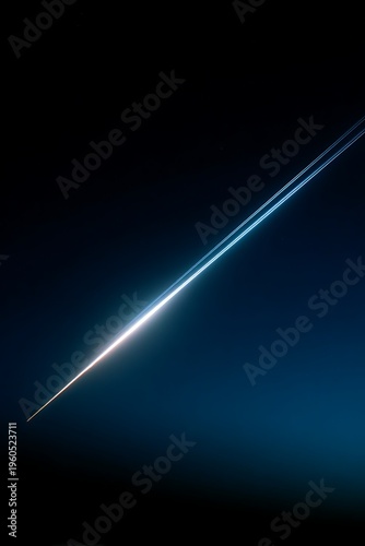 Light Trail Streak Across Dark Sky