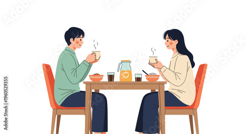 Happy young couple sitting at a dining table and enjoying a meal together with hot drinks and food for a cozy and romantic dinner at home.