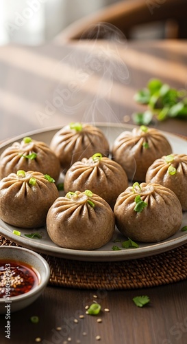 Delicious momos with dipping sauce.
