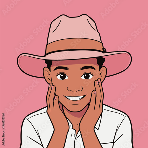 Boy smiles while wearing a pink hat against a plain pink background