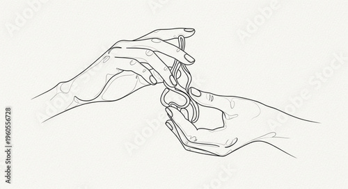 Hands holding small object.