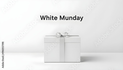 A white gift box with a ribbon on a plain background with the words White Munday