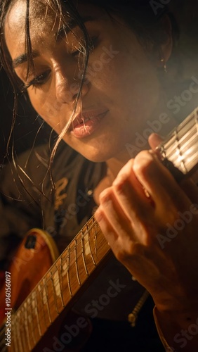 Passionate Musician Lost in the Melody of Electric Guitar Performance.