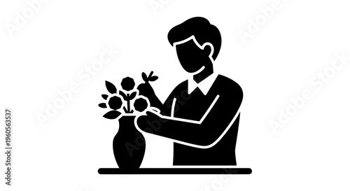 Man Arranging Flowers in Vase.