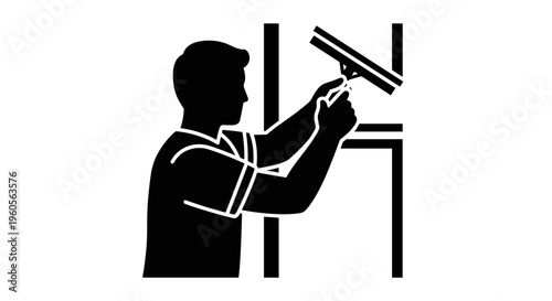 Man Cleaning Window with Squeegee.