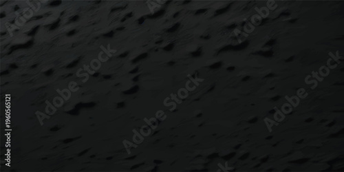 Dark, rugged, porous rock surface with craters and an otherworldly, extraterrestrial feel