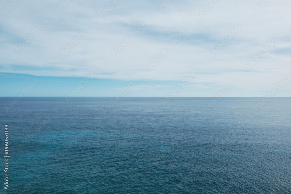 Fototapeta premium View of the ocean with blue tones and a smooth water texture