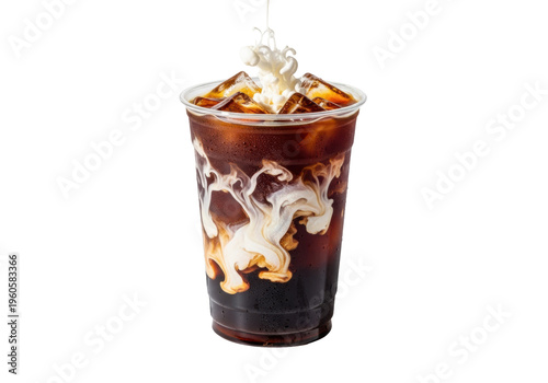 A clear pet plastic cup of cold brew with ice and oat milk swirling on a white studio background with copy space. Concept for beverage advertising