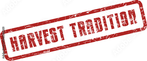 A weathered red rubber stamp prominently displays the important message Harvest Tradition on a clean surface