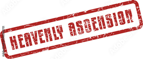 A weathered red rubber stamp prominently displays the profound message Heavenly Ascension on a clean surface