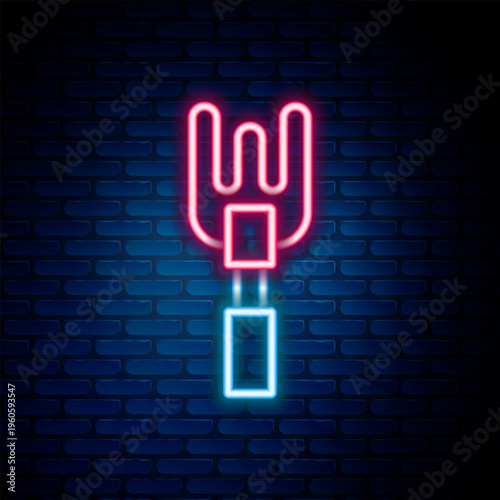 Glowing neon line Garden rake icon isolated on brick wall background. Tool for horticulture, agriculture, farming. Ground cultivator. Housekeeping equipment. Colorful outline concept. Vector
