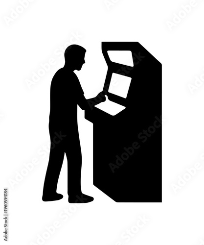 Male person playing retro arcade video game machine