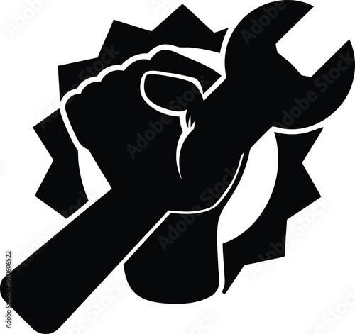 Hand firmly gripping wrench breaking through wall symbolic representation silhouette