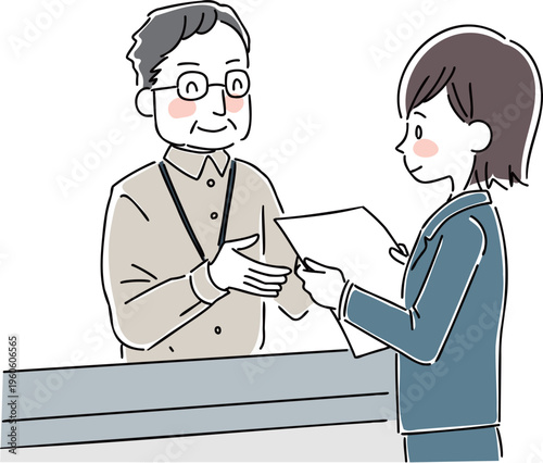 受付で対応する男性