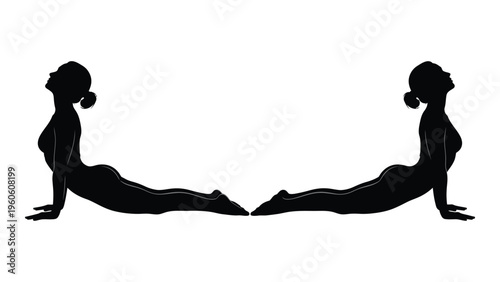 Two silhouettes of women performing the upward facing dog yoga pose facing each other