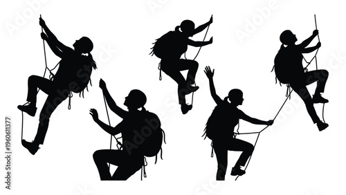 Silhouettes of rock climbers ascending a steep wall with ropes and harnesses