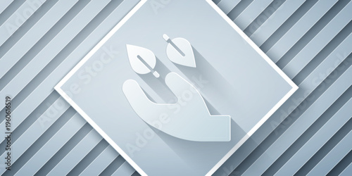 Paper cut Tea leaf in hand icon isolated on grey background. Tea leaves. Paper art style. Vector