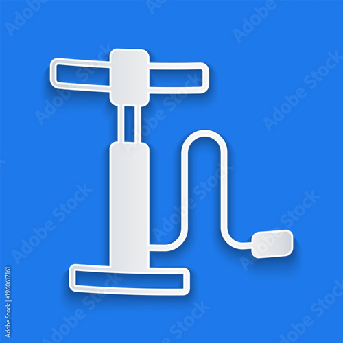 Paper cut Car air pump icon isolated on blue background. Paper art style. Vector