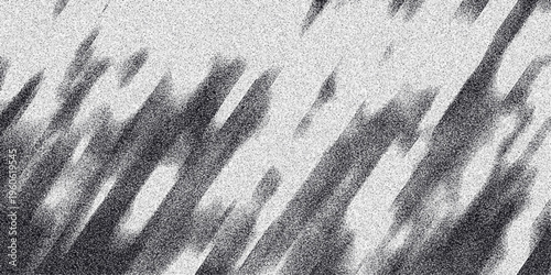 Abstract monochrome background with blurred diagonal dark brush strokes and a fine grainy texture, offering a soft yet dynamic visual for artistic applications and design