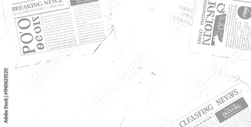 Newspaper pages with large bold headlines and columns of text in grayscale print article