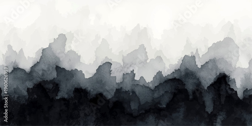 A misty morning panorama of the forest hills reveals a serene mountain landscape silhouetted against a soft sunrise sky as fog settles deep within the valley