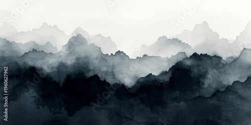 A majestic mountain landscape at dawn features a blue sky over a misty forest valley as the morning sun rises through fog and clouds to reveal a beautiful silhouette of hills