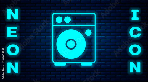 Glowing neon Guitar amplifier icon isolated on brick wall background. Musical instrument. Vector